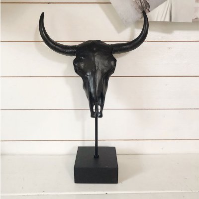 Bull skull svart på stativ