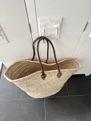 Väska med bruna läderremmar, Sid Sid